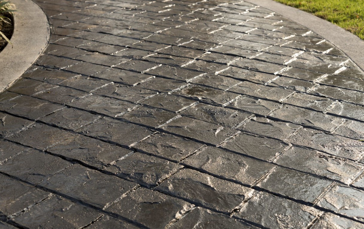 Decorative stamped concrete with natural stone pattern in Aventura, FL